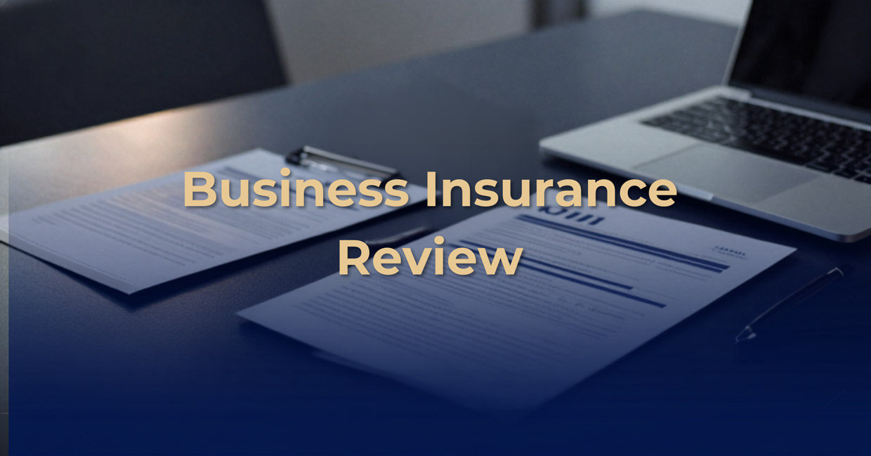 Business owner reviewing commercial insurance policies and risk management coverage with insurance advisor in 2026.